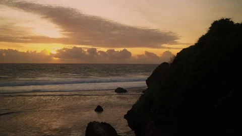 Aerial View of sunset Ocean Waves Moving Across Tropical Coast 스톡 동영상 331275498