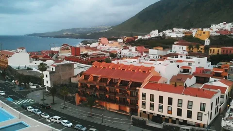 Aerial view at sunset - the orange roofs of Spanish houses in the small town of Stock Footage 112096200