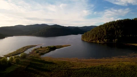 Aerial view of a sunset over a big lake Stock Footage 243596771