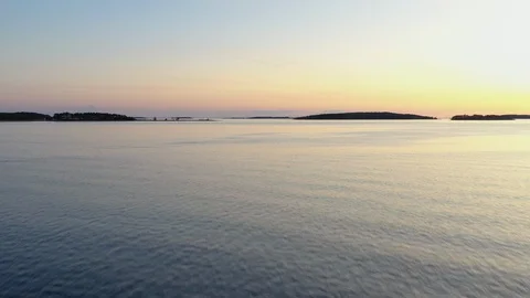 Aerial view of a sunset over a calm sea Video stock 124391591