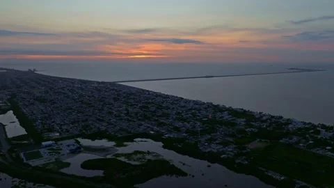 Aerial view of sunset over coast and cityscape, Mexico. Stock-Footage 284847654