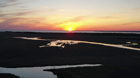 Aerial View of Sunset over Delaware Bay in New Jersey Видео 112682770
