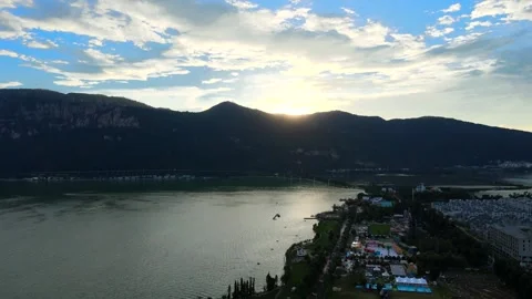 Aerial View of Sunset Over Dianchi Lake and Kunming Cityscape in Yunnan Province Stock Footage 342090611