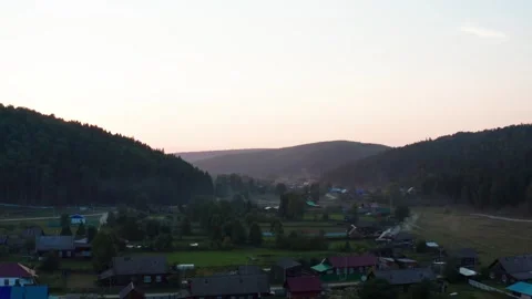 Aerial view of the sunset over the forest Stock Footage 252026709