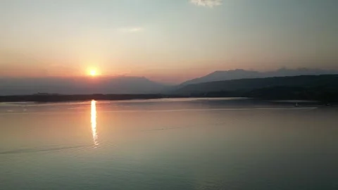 Aerial view of sunset over Lago di Viverone, Italy. Stock Footage 288468913