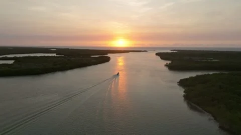 Aerial view of sunset over marshland and coastline, Mexico. Stock-Footage 284847849