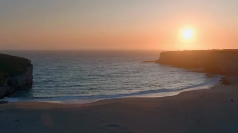 Aerial view of sunset over the Pacific Ocean in California Stock Footage 316416360