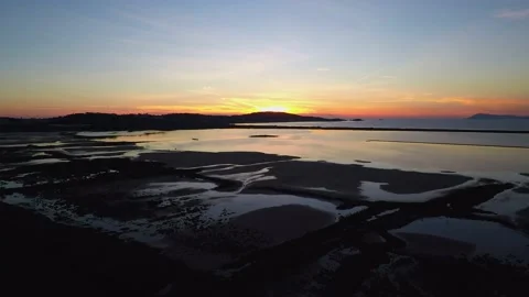 Aerial view of a sunset over the salt flats Stock Footage 236972989