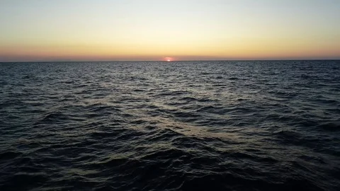 Aerial view of a sunset over the sea Stock Footage 118316618