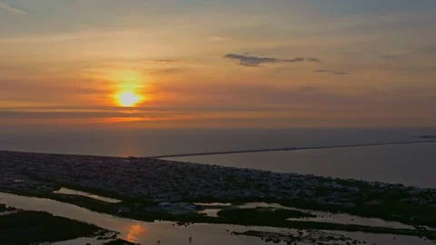 Aerial view of sunset over tranquil sea and coast, Mexico. Stock Footage 284847627