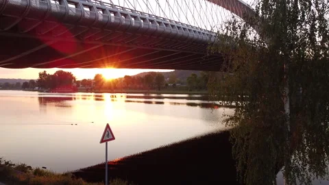 Aerial view of a sunset over the Troja Bridge and the Vltava river Stock Footage 161109555