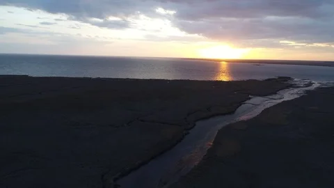 Aerial View of Sunset over Water Stock Footage 75509135