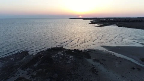Aerial View of Sunset over Water 스톡 동영상 75509208