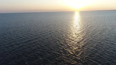 Aerial View of Sunset over Water Stock Footage 75509216