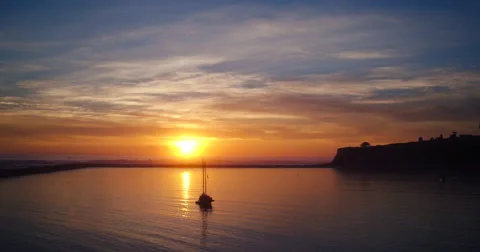 Aerial View Sunset into Pacific Ocean. Flying Low Over Water Video stock 62968936