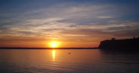 Aerial View Sunset into Pacific Ocean. Flying Low Over Water Video stock 62968945
