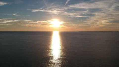Aerial View of Sunset Reflected Over the Sea Stock Footage 129252036