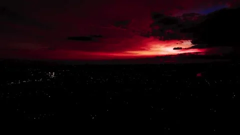 Aerial View of Sunset Sky Over Developed City Stock Footage 345551130