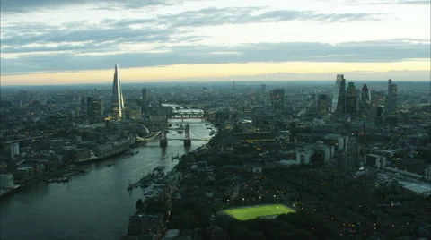 Aerial view at sunset of the suspension Tower Bridge over River Thames London UK Stock Footage 68064320
