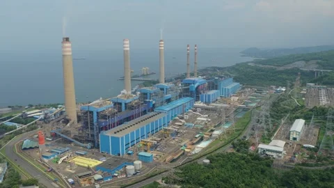 Aerial view of the suralaya steam power plant, a massive coal fired industrial Stock Footage 328086853