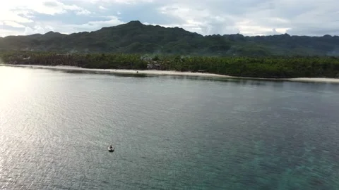 Aerial view of surface of water, from which zenith sun is reflected, boat in Stock Footage 232644777