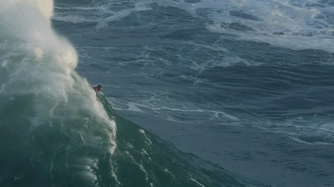 Aerial view surfer on large wave Mavericks USA Video stock 104264162