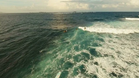 Aerial view surfers on the waves.Siargao, Philippines. Cloud 9. Stock Footage