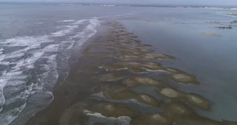 Aerial view of the surrounding flooded beach at L'estiguette, South of France Stock Footage 201058990