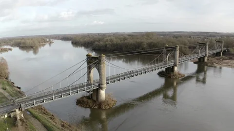 Aerial view of the suspension bridge across the river Loire in Langeais, France. Stock Footage 100034209