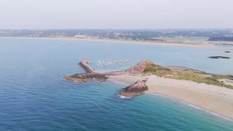 Aerial view of a sweeping aerial view of Port les Hopitaux in Erquy, Brittany Stock Footage 346667314