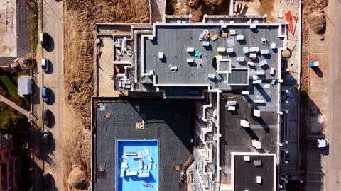 Aerial view of swimming pool construction in courtyard Stock Footage 331945790
