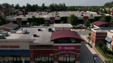 Aerial view of T-Mobile and shops in Germantown, Maryland Stock Footage 201766959