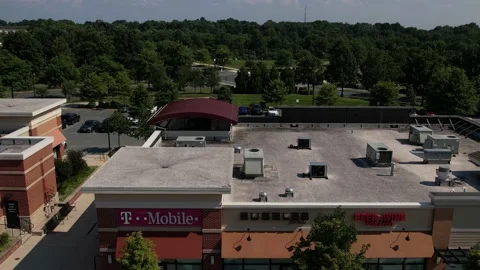 Aerial view of T-Mobile and shops in Germantown, Maryland Stock Footage 201767015