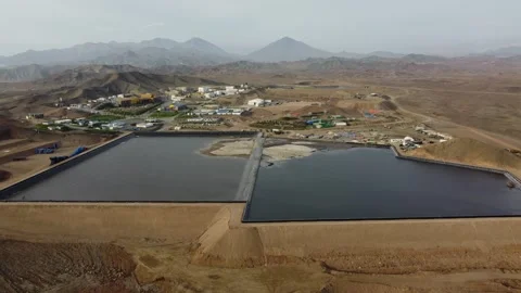 Aerial view of tailing ponds in a mining camp Stock Footage 337673719
