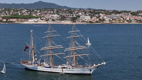 Aerial view of a tall ship off the coast of Cascais, Portugal. Stock Footage 344963733