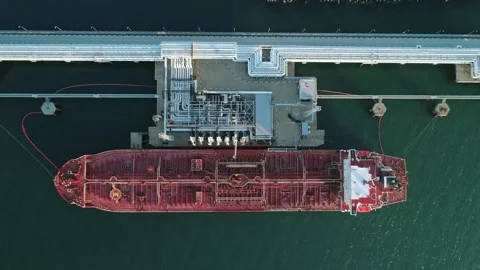 Aerial view of a tanker is loading in oil berth harbour terminal. Video stock 196221906