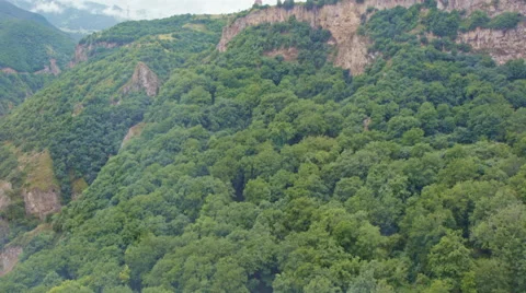 Aerial  view on Tatev valley monastery from a cableway Stock Footage 65379736