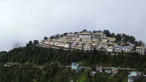 Aerial view of Tawang Monastery surrounded by lush alpine trees in Tawang 動画素材 346181848