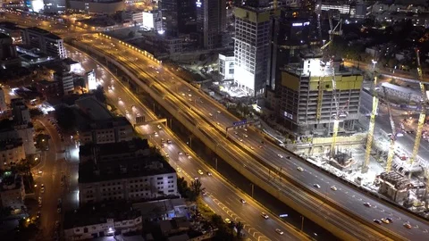 Aerial View Of Tel Aviv Skyline At Night, Ayalon Freeway Tilt Up Vídeo Stock 80385231