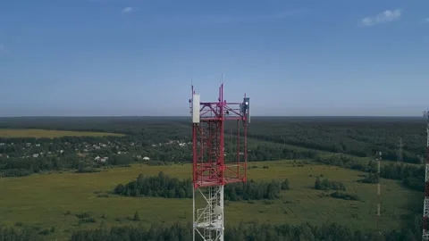 Aerial view to telecom tower for troubleshooting of the communication equipment Stock Footage 137760646