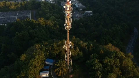 Aerial view on Telecommunication tower of cell phone antenna. Stock Footage 94359016