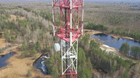 Aerial view to the telecommunication tower installed for the cellular network Stock Footage 152580801
