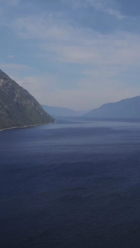 Aerial view of Teletskoye Lake between mountains, Altai Republic, Russia Stock Footage 335663045