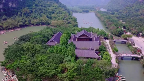 Aerial View of Temple and River in Tam Coc, Ninh Binh, Vietnam Stock Footage 278076489