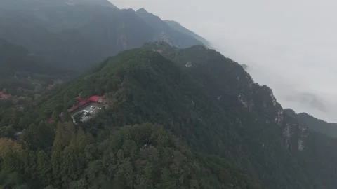 Aerial View of Temple Complex on Forested Ridge Above Clouds, Lushan Video stock 346715156