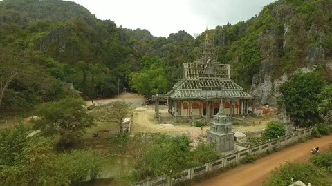 Aerial view of temple surrounded by scaffolding as restoration work, Cambodia Stock Footage 83535054