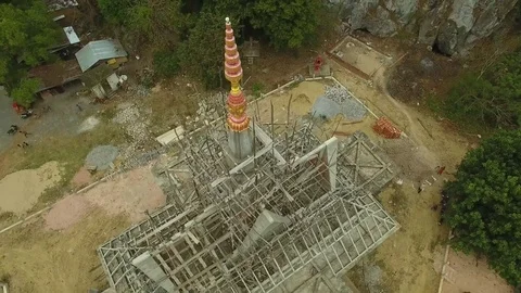 Aerial view of temple surrounded by scaffolding as restoration work, Cambodia Stock Footage 83535154