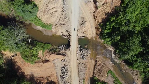Aerial view of the temporary bridge that vehicles pass through, the constru.. Stock Footage 248341146