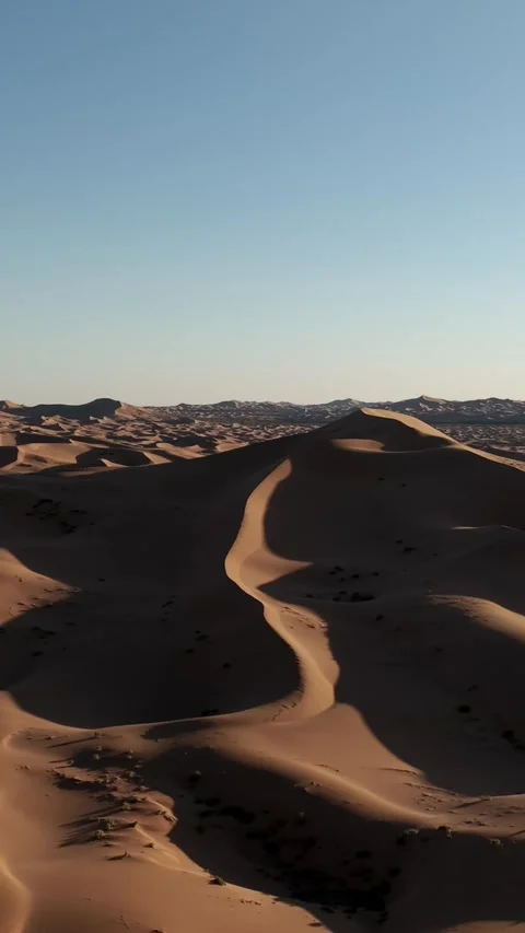 Aerial View of Tengger Desert Dunes at Golden Hour Stock Footage 345367501