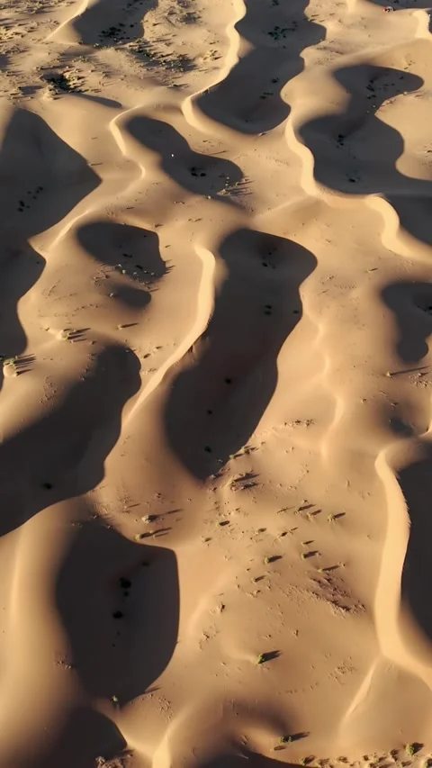 Aerial View of Tengger Desert Dunes and Road Stock Footage 345368241